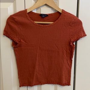 American Eagle smocked burnt orange top